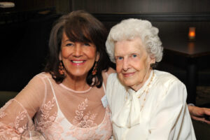 Resident Services Director Valeri Williams mingles with residents on Mother’s Day. Here she enjoys a moment with Janet Carlson, formerly of Hanover.